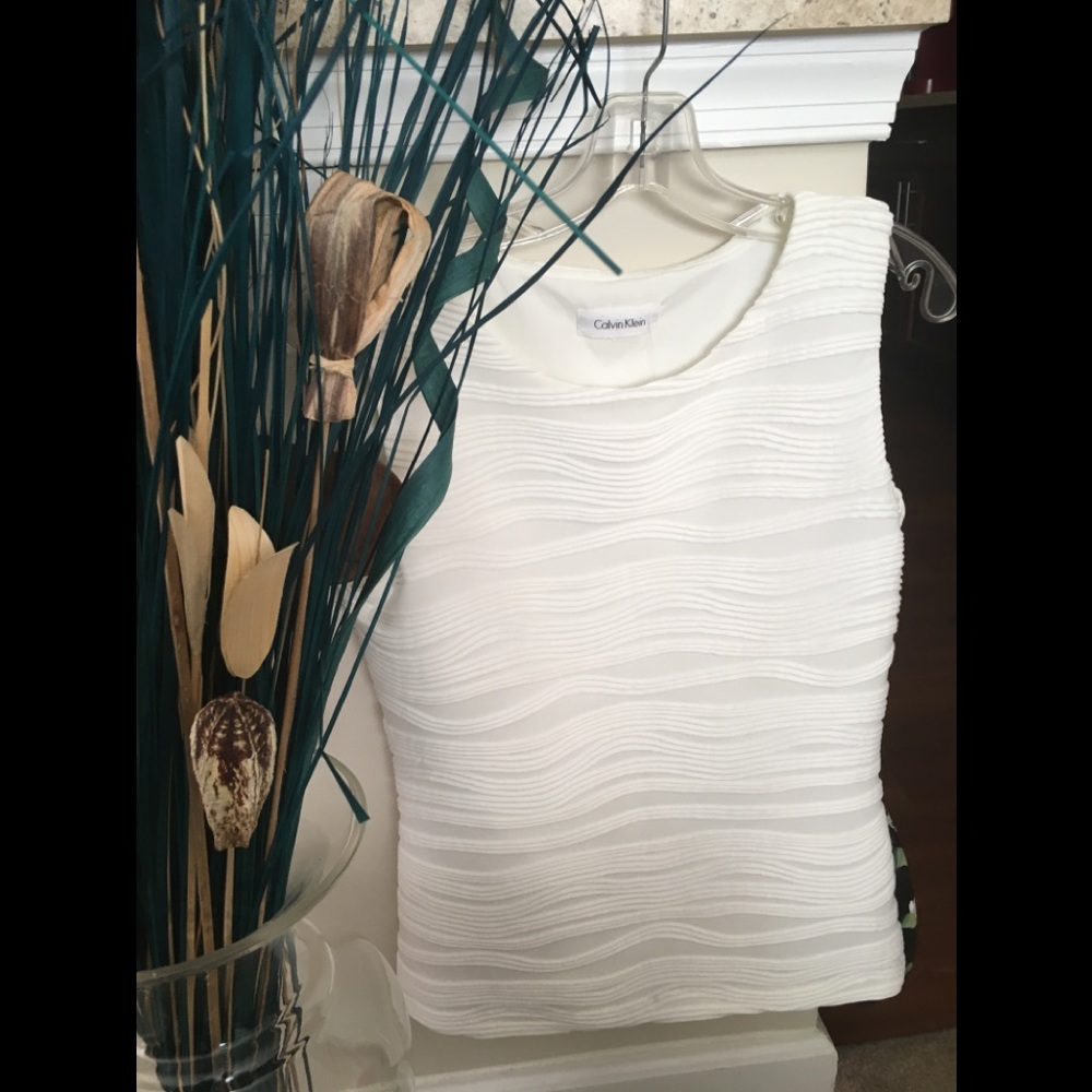 White sleeveless blouse